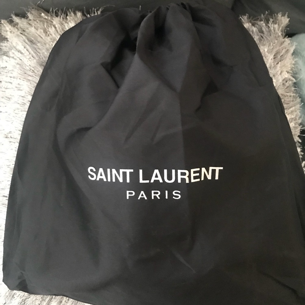 Black handbag with black chain strap